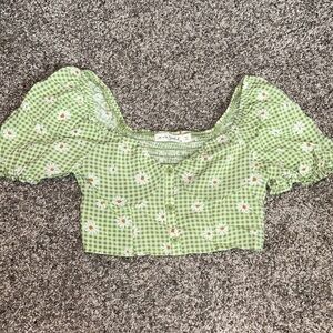 Live to be spoiled green daisy plaid crop top